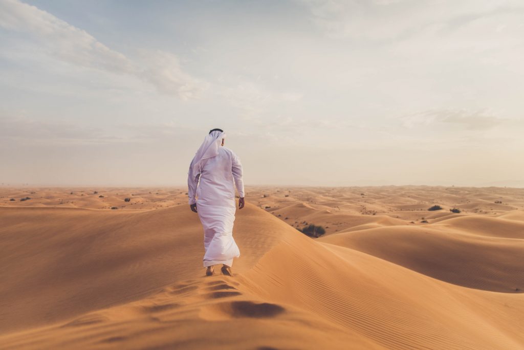 Man alone in desert