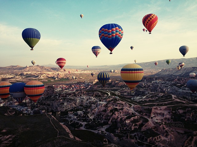 Cappadocia, Turkey - colorful hot air balloons flying in the sky